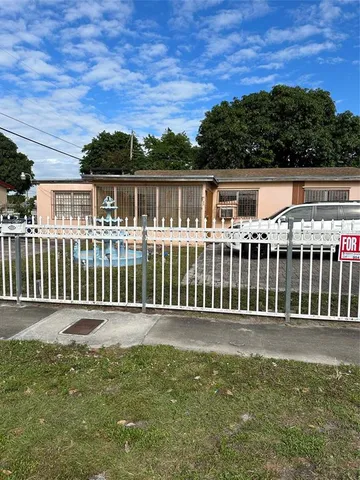 a front view of a house having yard
