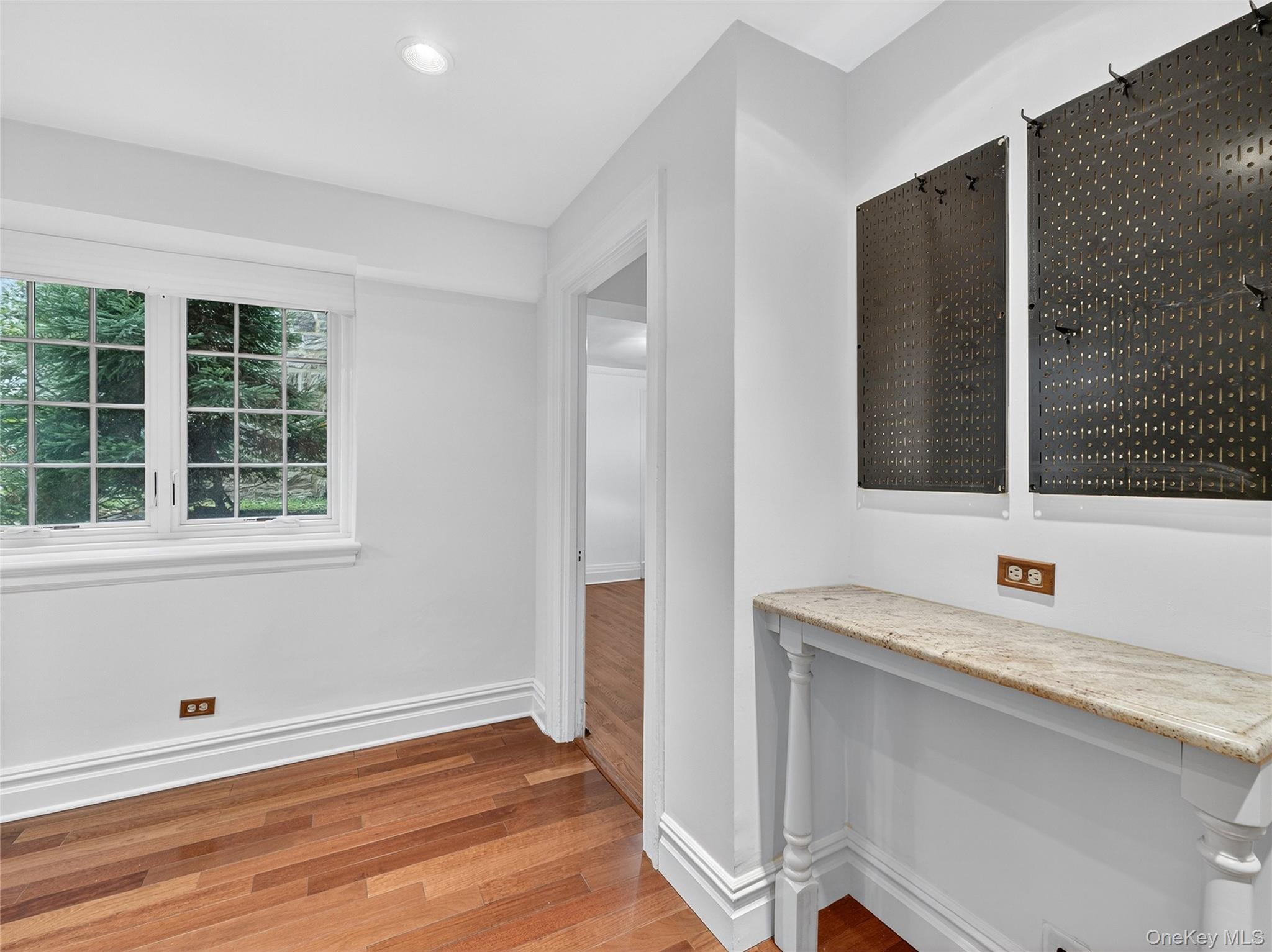 1 Rivermere, Unit I Bronxville, NY 10708 - Photo 7 of 20 a bathroom with a sink and a mirror
