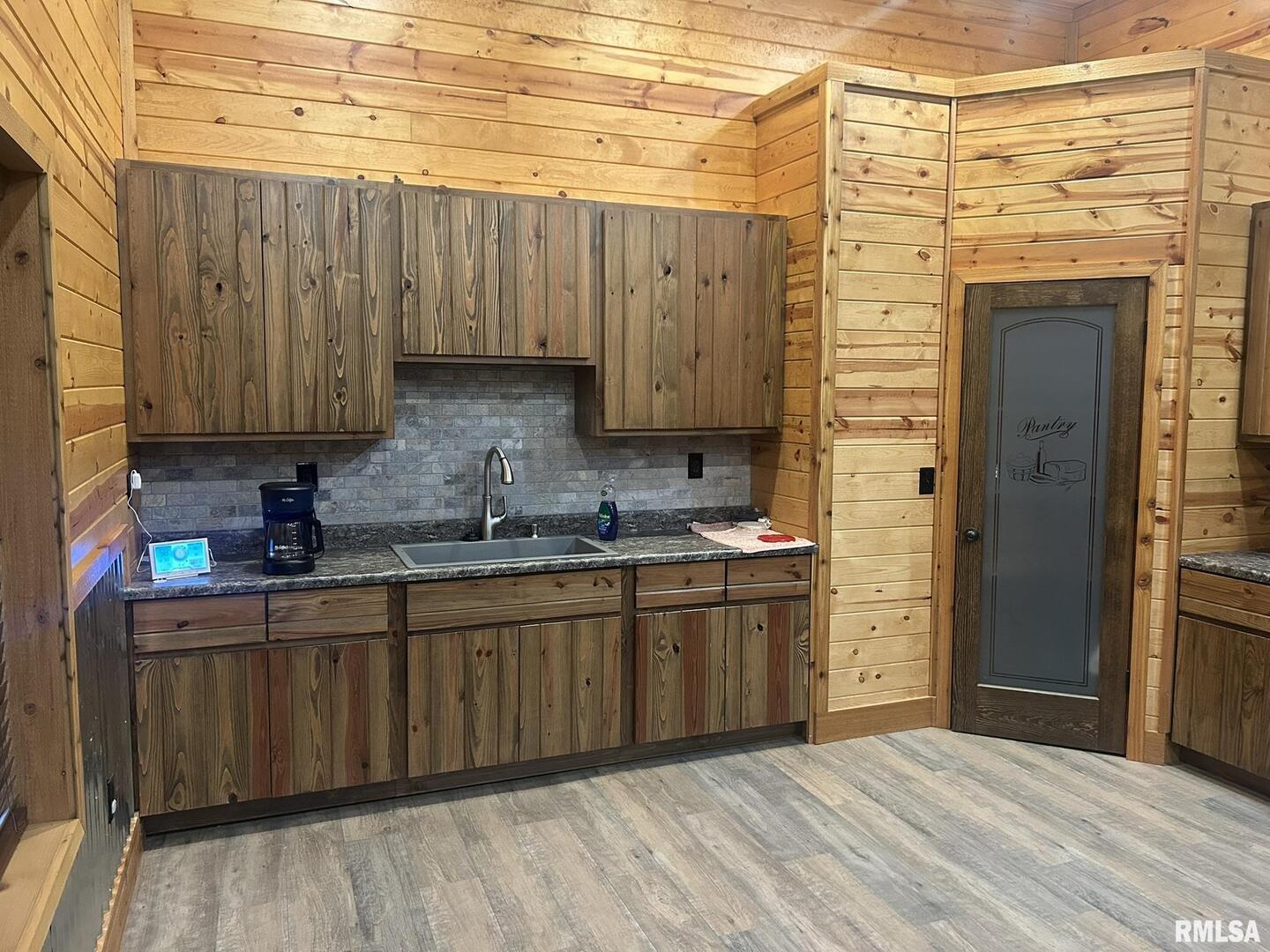 40 Presley Loop Golconda, IL 62938 - Photo 16 of 40 a kitchen with stainless steel appliances granite countertop a sink and cabinets