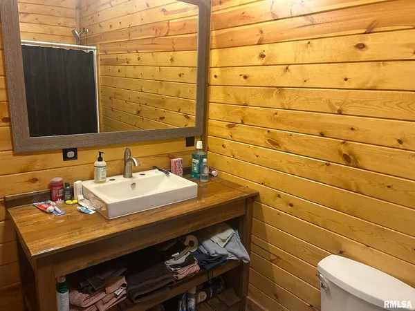 a bathroom with a sink and a toilet