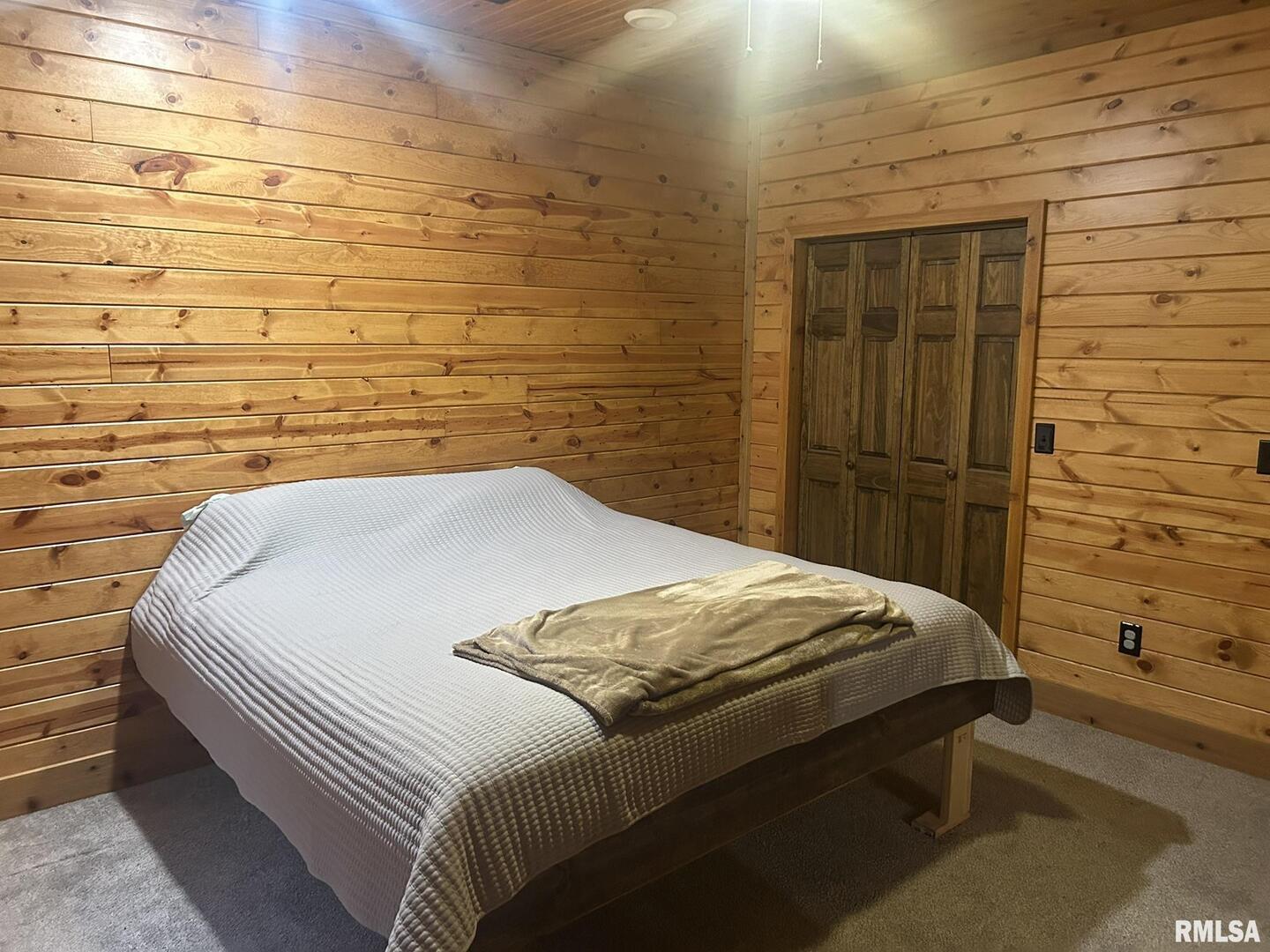 40 Presley Loop Golconda, IL 62938 - Photo 31 of 40 a bedroom with a bed and a shower