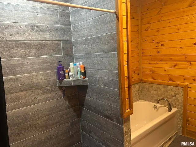 a bathroom with a bathtub