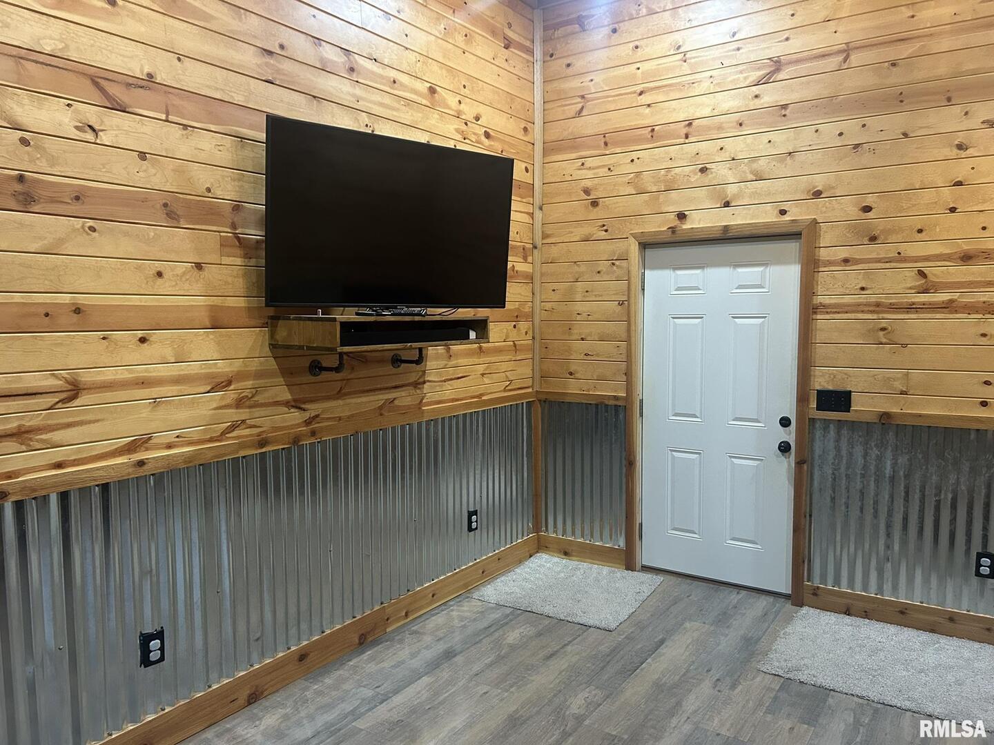 40 Presley Loop Golconda, IL 62938 - Photo 36 of 40 a living room with a flat screen tv on the wall