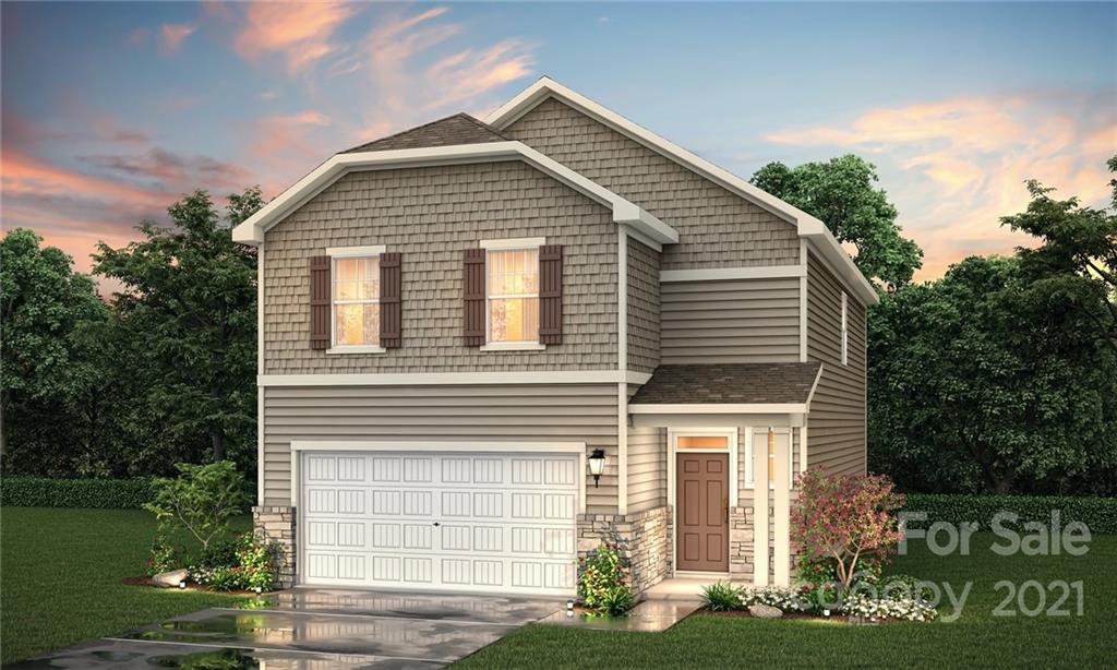 1019 Maylen Trace, Unit 164 Monroe, NC 28110 - Photo 2 of 4 a front view of a house with garden