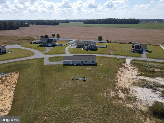 a view of a lake with a car parked