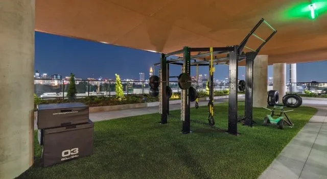 a view of a backyard with sitting area and fire pit