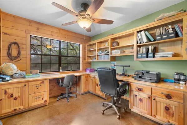 a view of a workspace with furniture