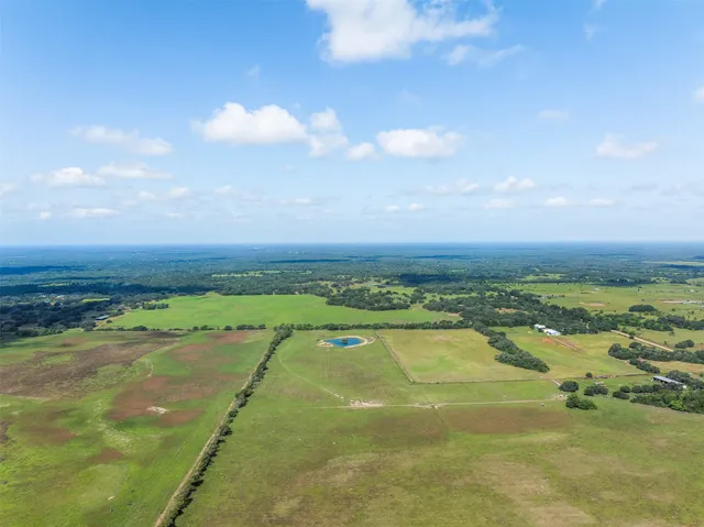 a view of a lake with a city