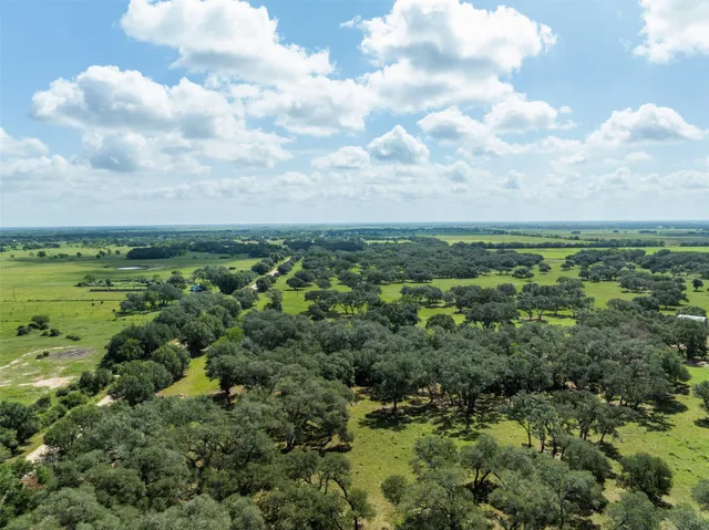 a view of a lake with a city