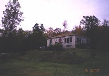 162 Jackson Road Savoy, MA 01256 - Photo 1 of 1 a front view of a house with yard