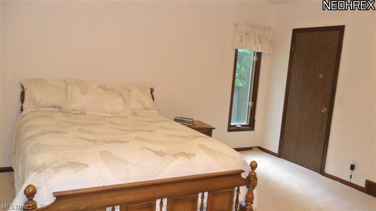 12446 Woodin Road Chardon, OH 44024 - Photo 11 of 19 Master bedroom with large walk-in closet and separate bath.