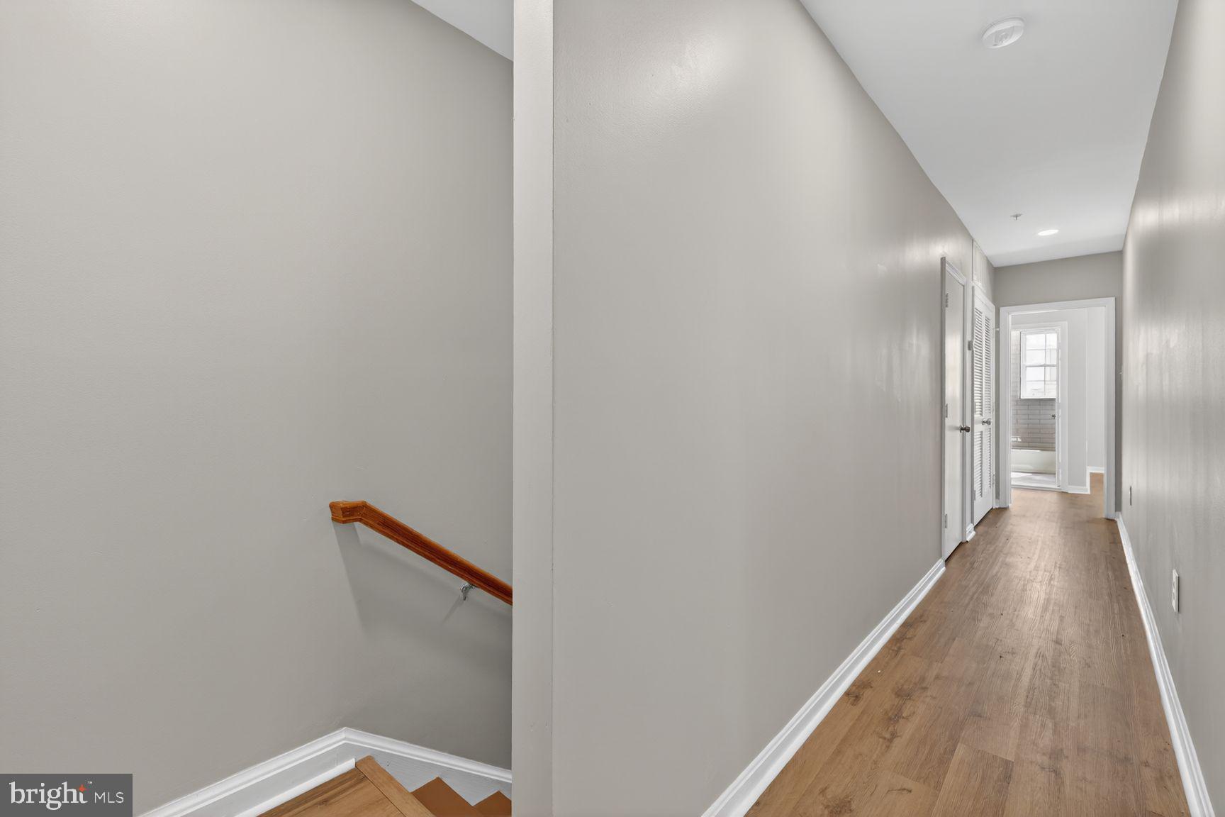 1008 Rittenhouse Street Northwest, Unit 15 Washington, DC 20011 - Photo 23 of 39 a view of a hallway with wooden floor