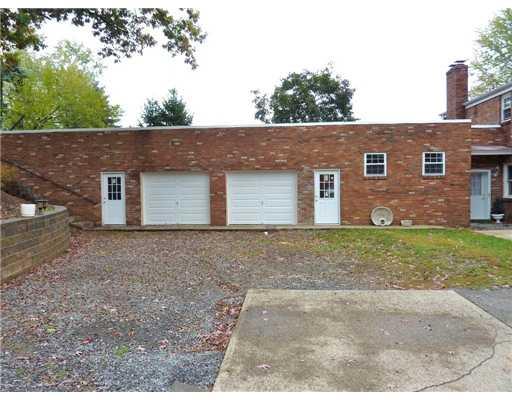 933 Cumberland Road Pittsburgh, PA 15237 - Photo 15 of 18 Exterior Back. EXTRA 2-CAR GARAGE. RECENTLY REFINISHED
