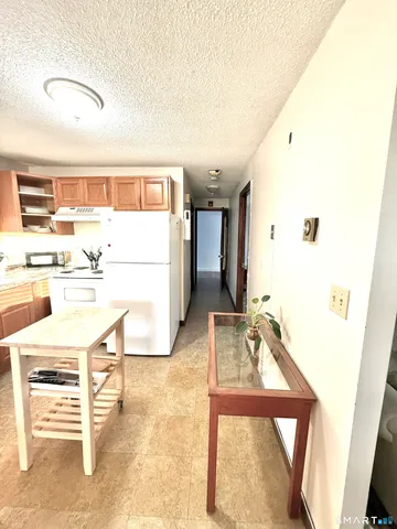 view of living room with furniture and a window