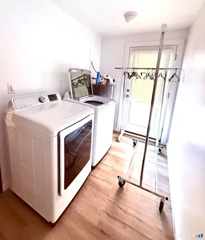 a utility room with dryer and washer