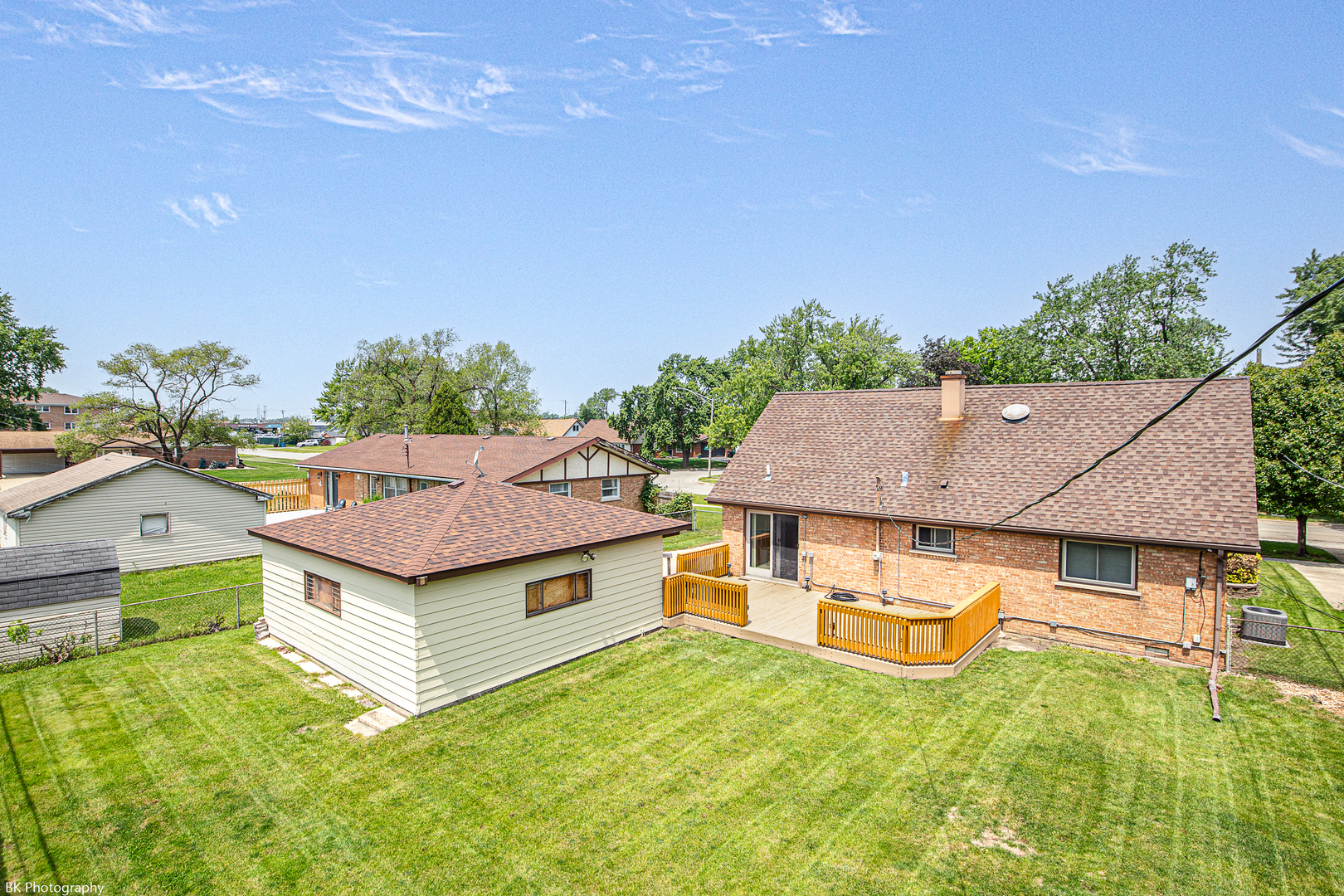 7049 West 91st Street Bridgeview, IL 60455 - Photo 24 of 25 a aerial view of a house with swimming pool garden and patio