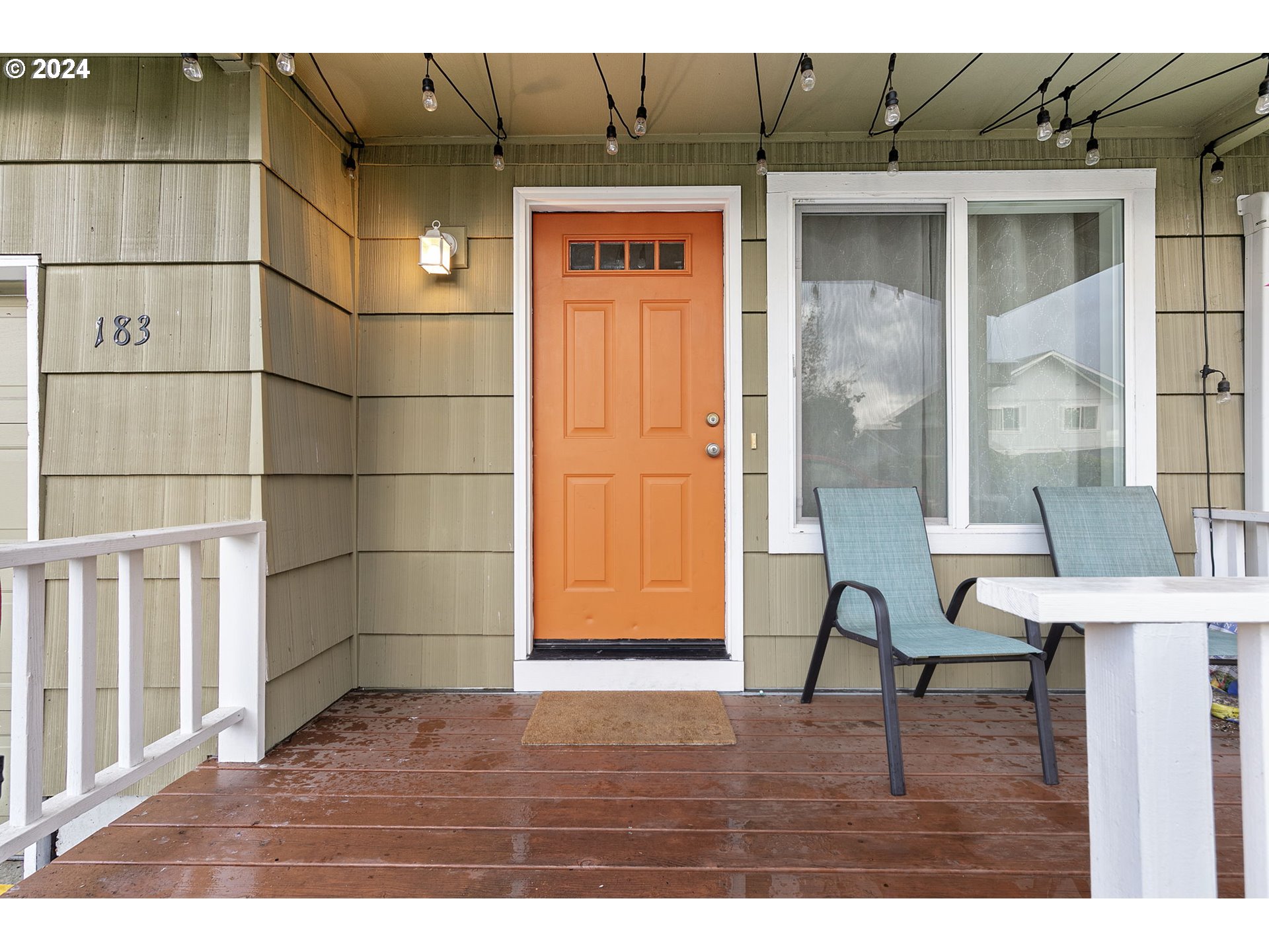 183 35th Street Springfield, OR 97478 - Photo 6 of 36 a view of a door and chair in wooden floor
