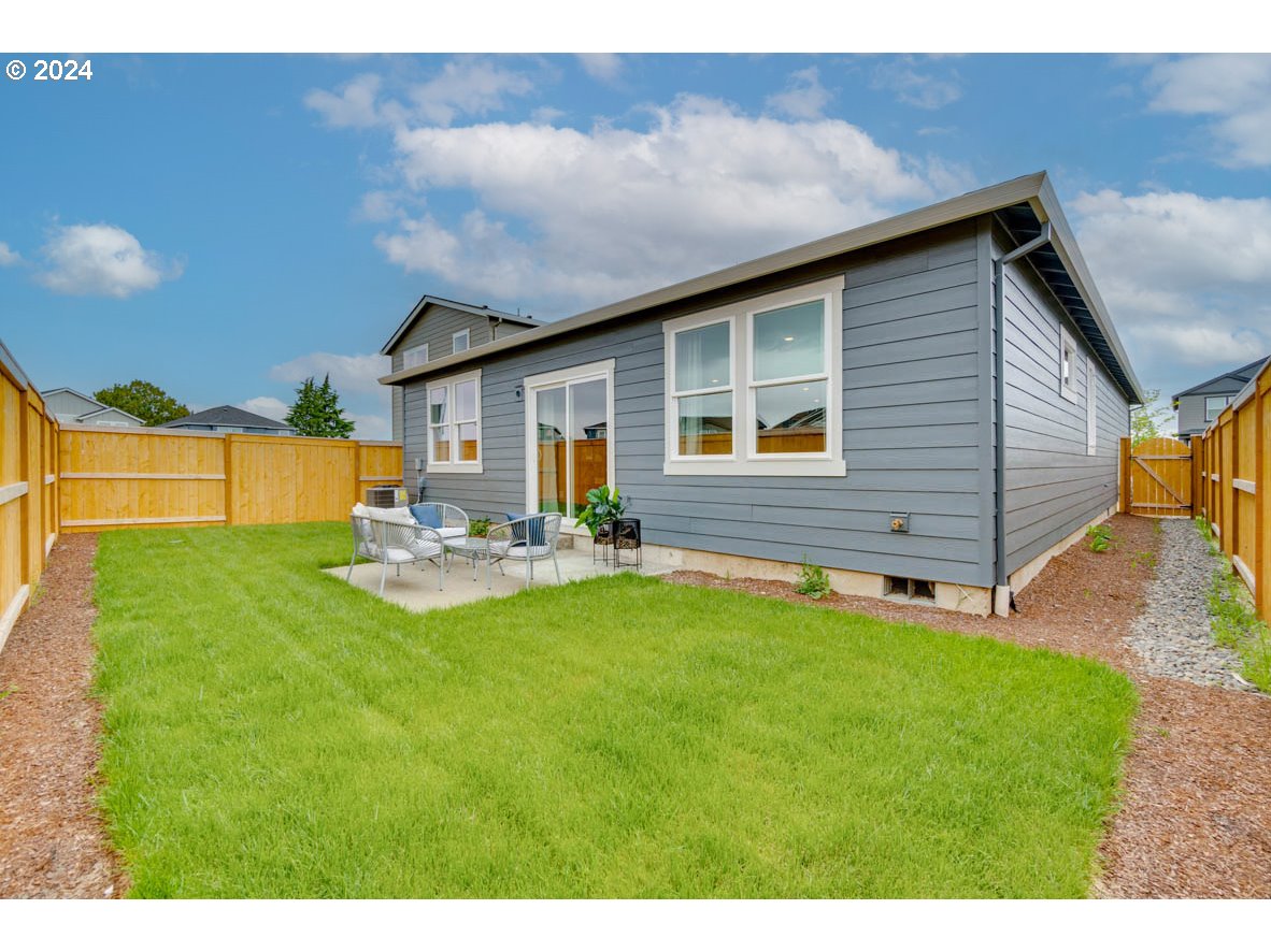 2768 U Street Springfield, OR 97477 - Photo 24 of 24 a front view of house with yard and seating area