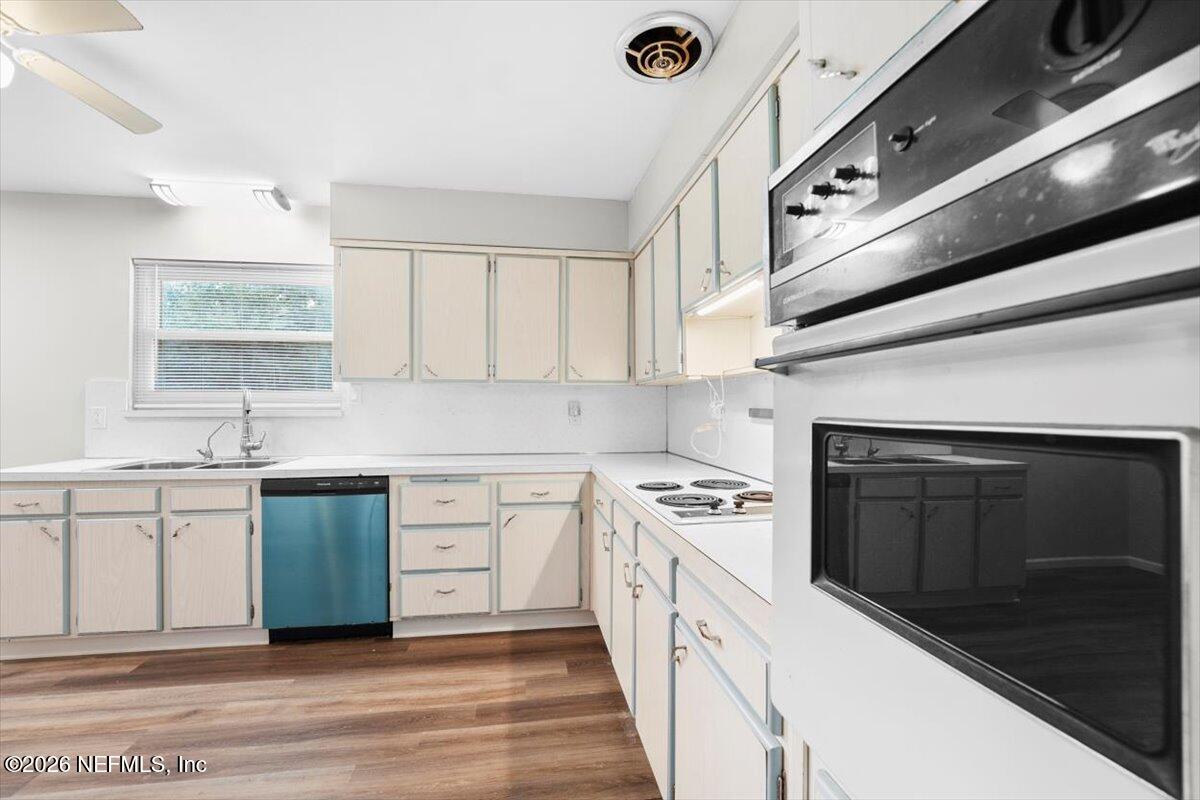 5376 Sanders Road Jacksonville, FL 32277 - Photo 14 of 44 a kitchen with a stove oven and sink