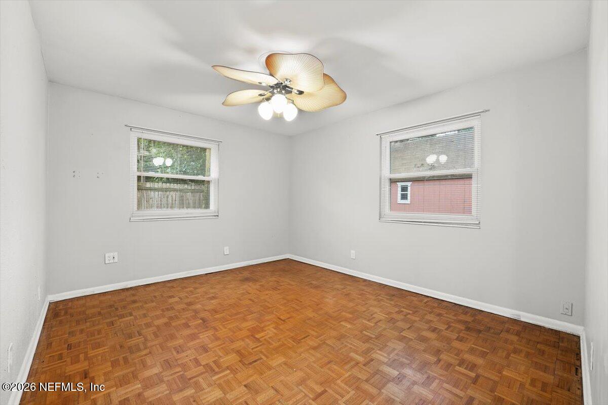 5376 Sanders Road Jacksonville, FL 32277 - Photo 20 of 44 a view of an empty room with a window