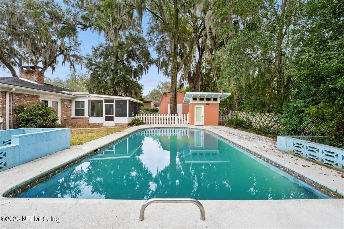5376 Sanders Road Jacksonville, FL 32277 - Photo 30 of 44 a view of swimming pool with a back yard