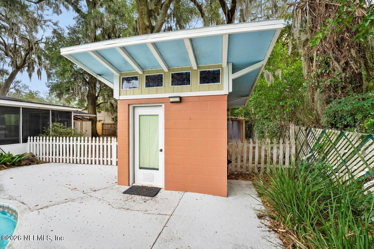5376 Sanders Road Jacksonville, FL 32277 - Photo 31 of 44 a front view of a house with a yard