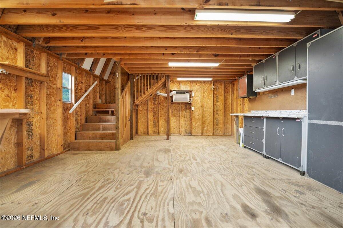 5376 Sanders Road Jacksonville, FL 32277 - Photo 34 of 44 a view of an empty room with wooden floor