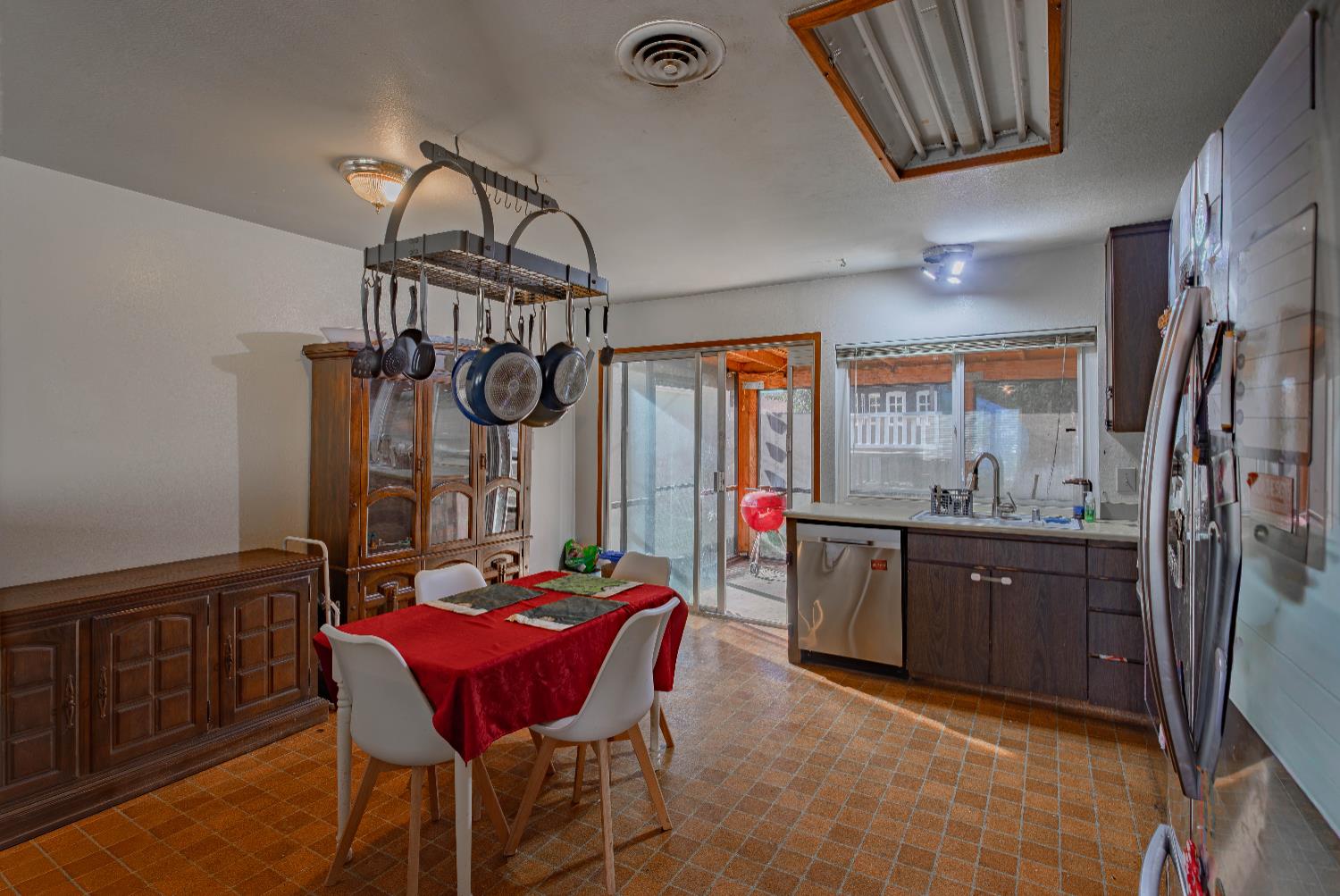 2322 Foust Street Marysville, CA 95901 - Photo 12 of 26 a view of a dining room with furniture window and wooden floor