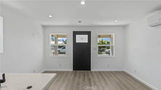 an empty room with windows