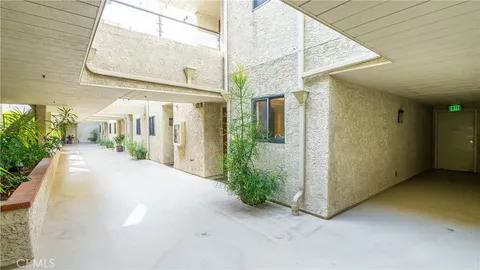 a view of a street with a building