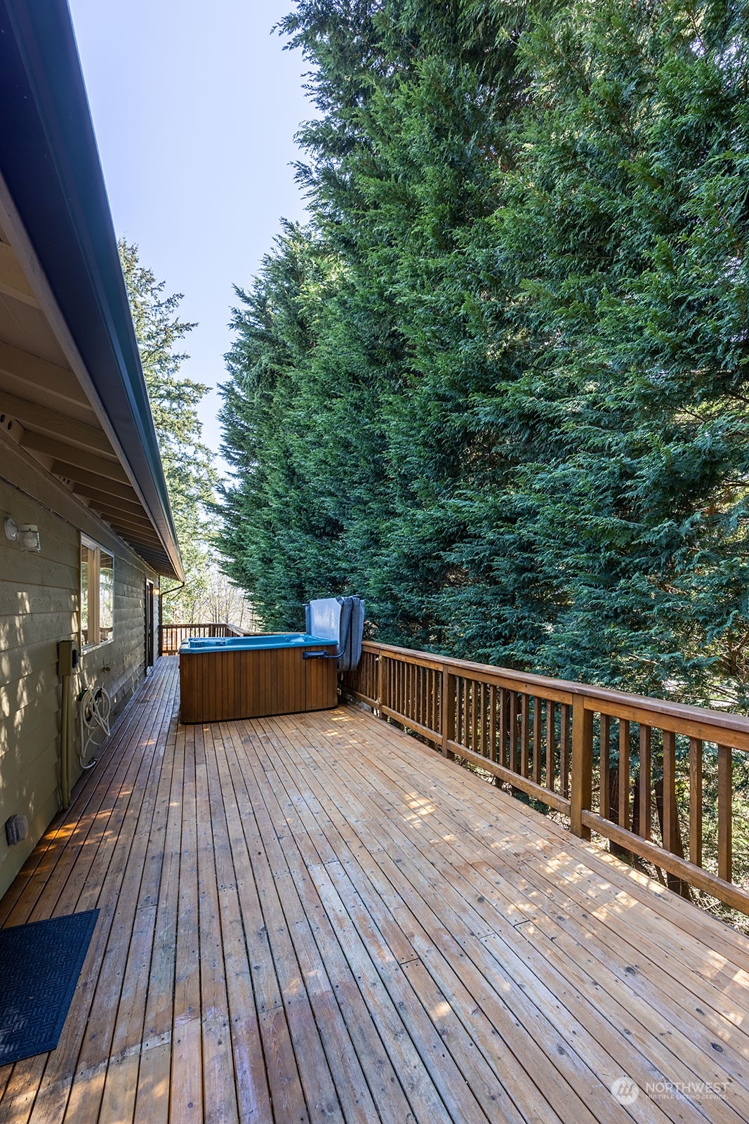 2116 242nd Street Southwest Bothell, WA 98021 - Photo 36 of 38 a balcony with wooden floor and outdoor space