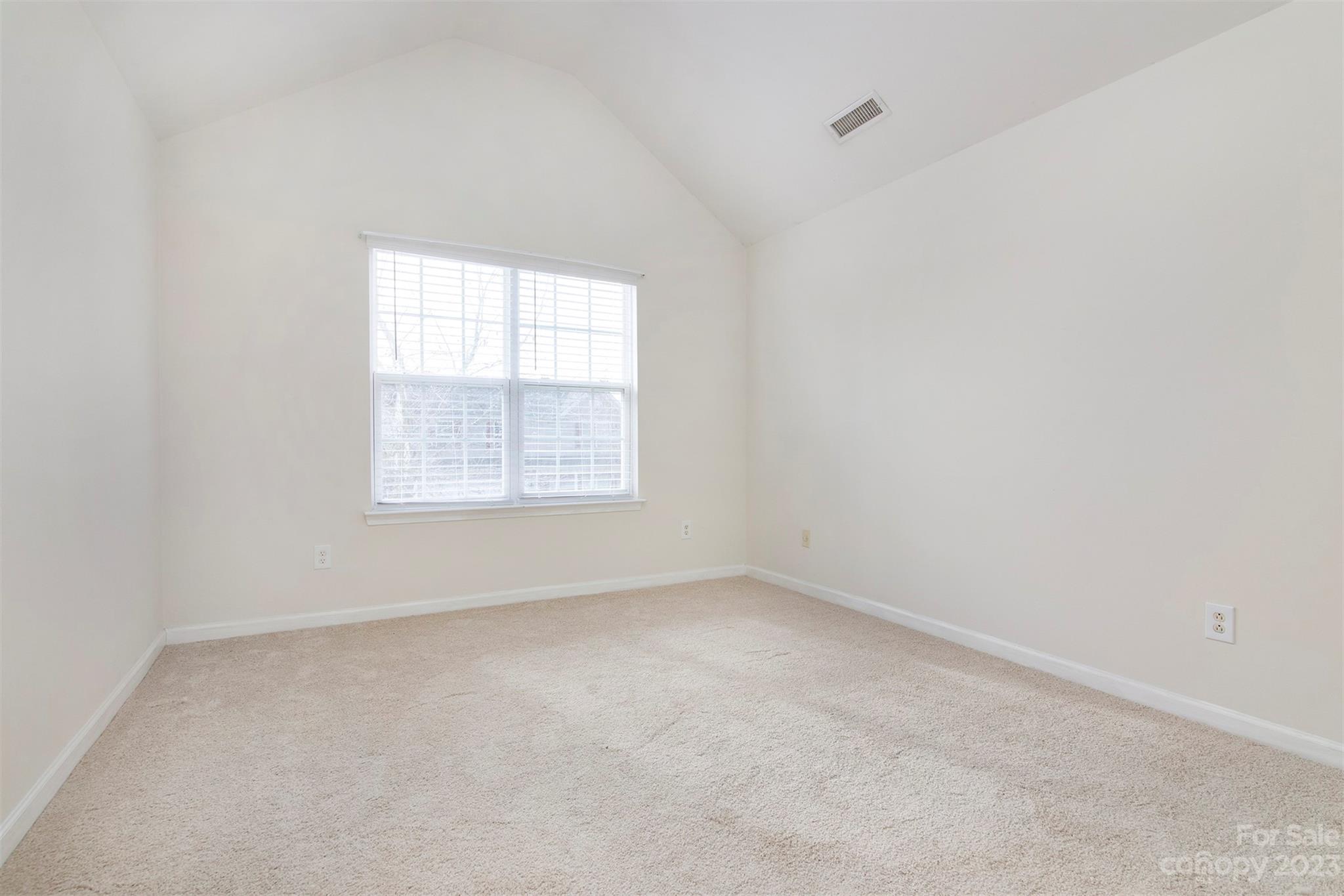 9629 Rothman Lane Charlotte, NC 28215 - Photo 17 of 24 an empty room with a window