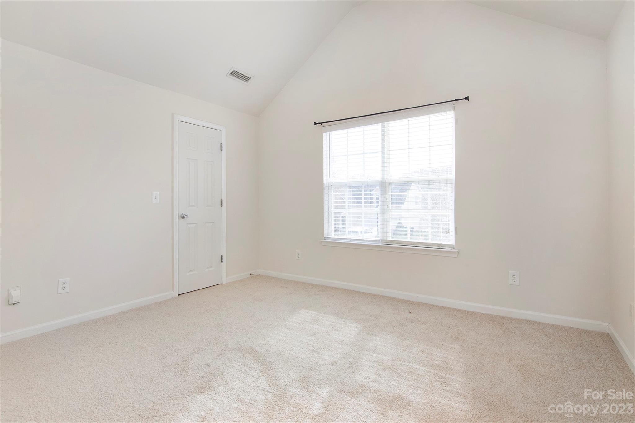 9629 Rothman Lane Charlotte, NC 28215 - Photo 18 of 24 an empty room with a window