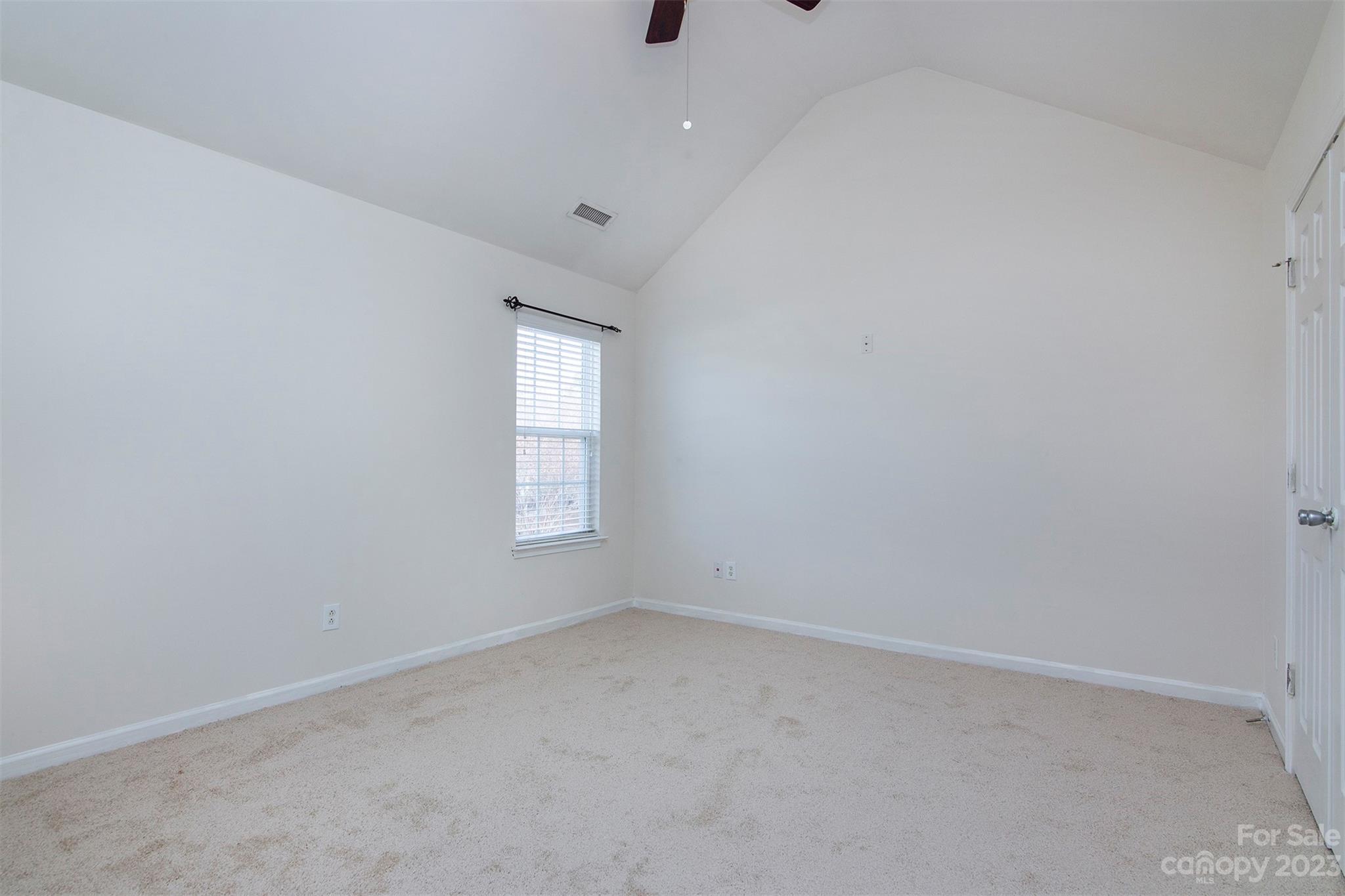 9629 Rothman Lane Charlotte, NC 28215 - Photo 21 of 24 an empty room with a window
