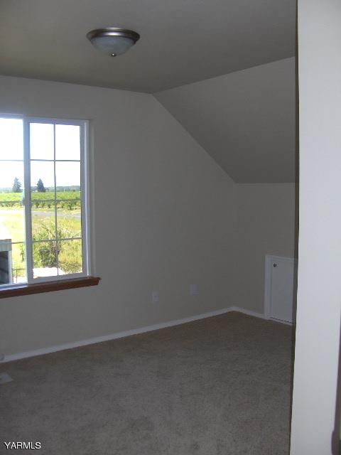 1040 Lombard Loop Road Wapato, WA 98951 - Photo 18 of 25 an empty room with a window