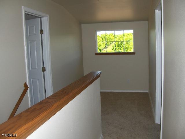 1040 Lombard Loop Road Wapato, WA 98951 - Photo 19 of 25 a view of balcony and a hallway