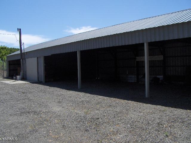 1040 Lombard Loop Road Wapato, WA 98951 - Photo 6 of 25 a view of a backyard