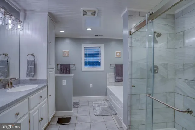 a bed room with a bed and furniture