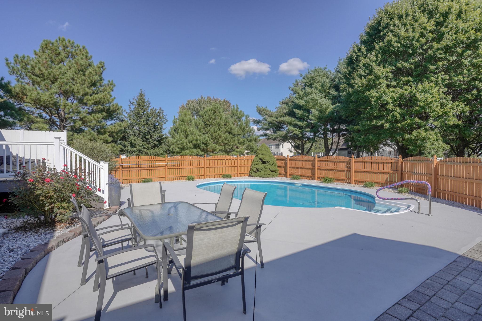 6420 Pearsons Corner Road Dover, DE 19904 - Photo 43 of 54 a view of a chairs and table on the terrace