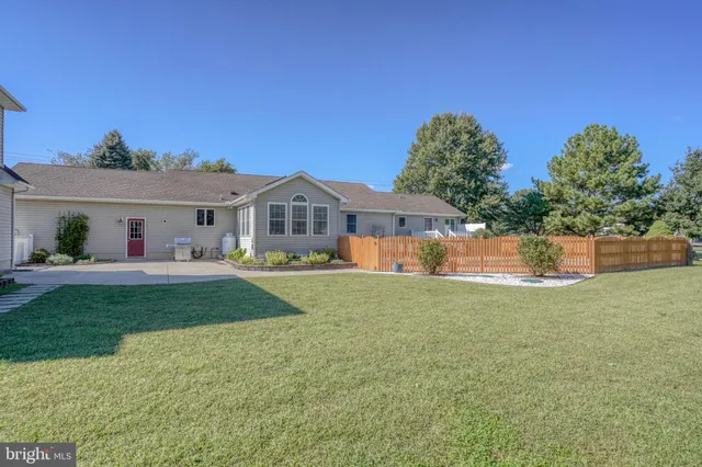 a view of a storage room with racks on the wall
