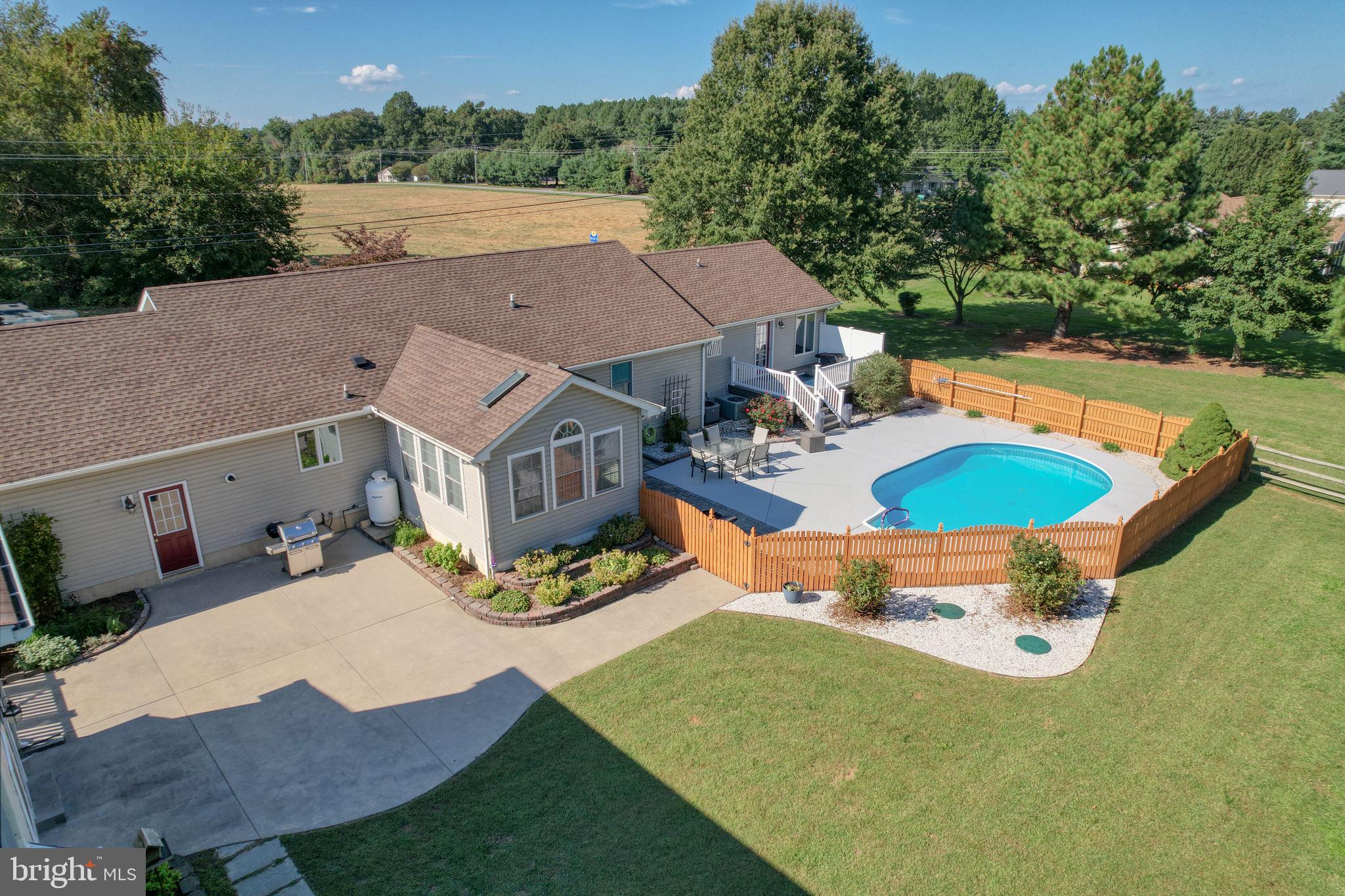 6420 Pearsons Corner Road Dover, DE 19904 - Photo 51 of 54 an aerial view of a house with yard swimming pool and outdoor seating