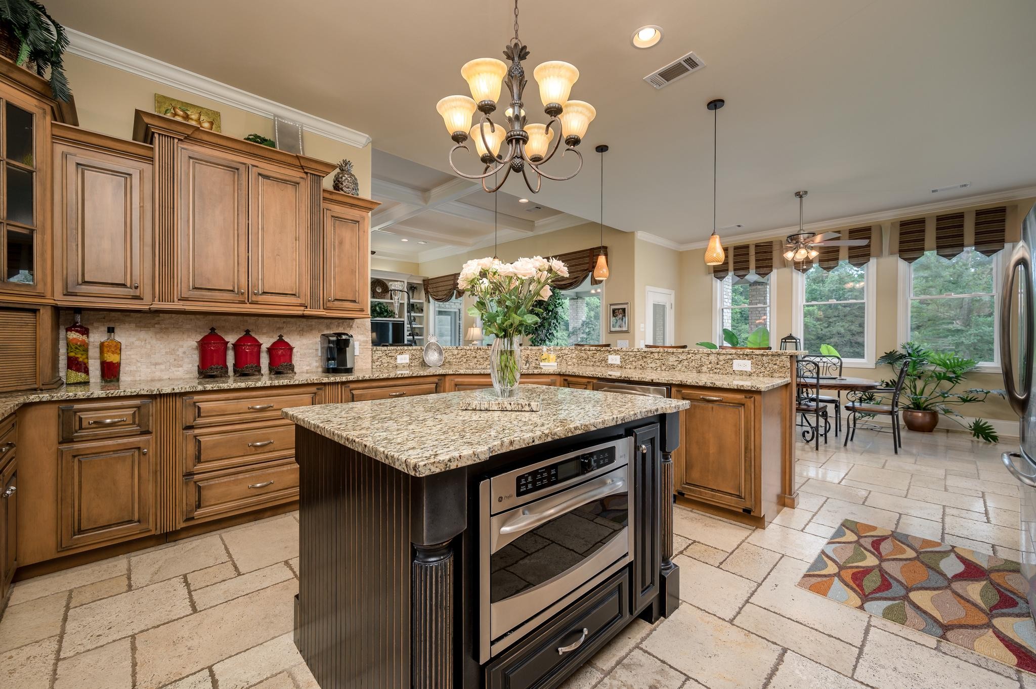 6201 Windrow Road Rockvale, TN 37153 - Photo 12 of 49 a kitchen with stainless steel appliances granite countertop a stove a sink and a refrigerator