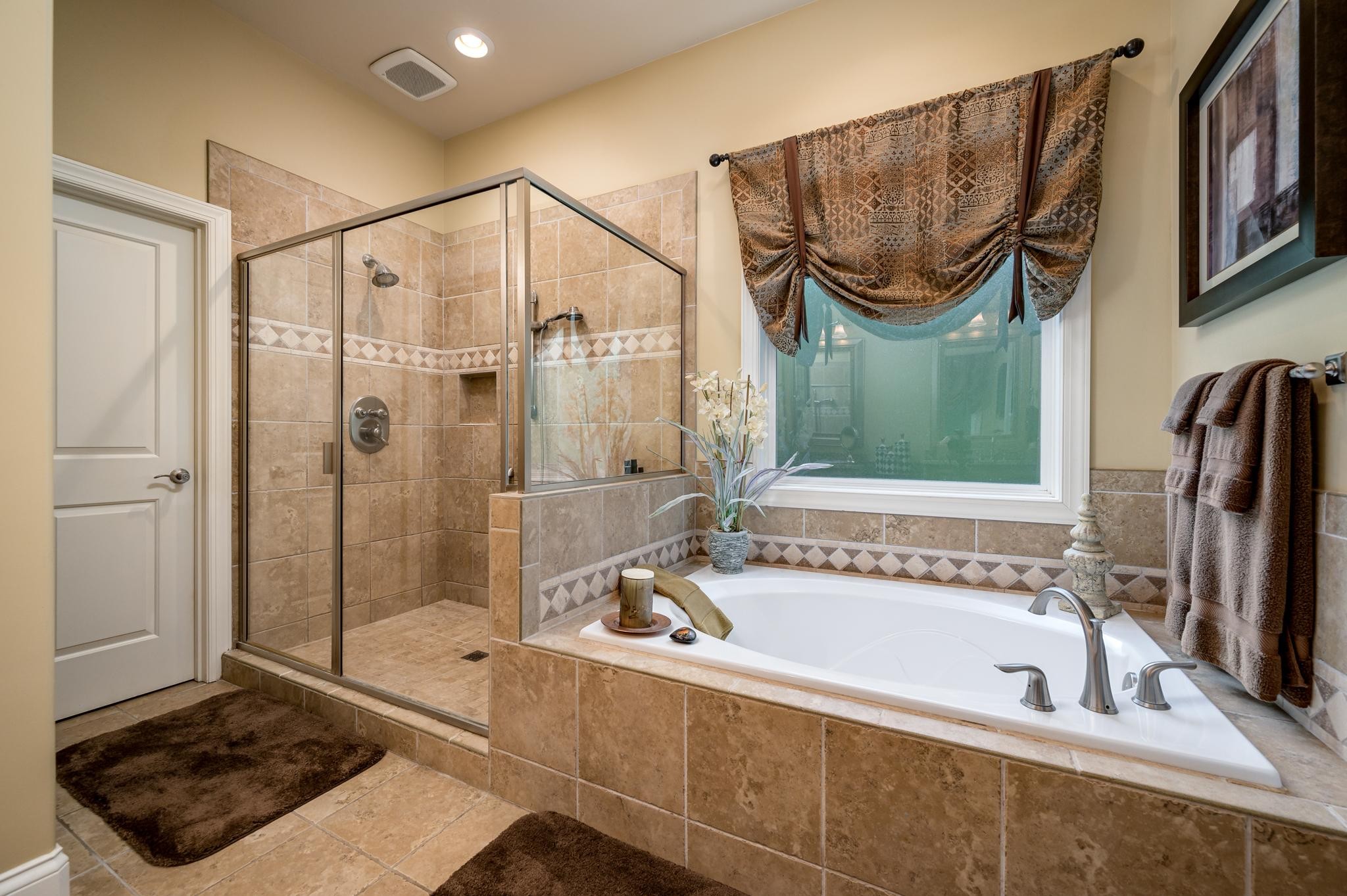 6201 Windrow Road Rockvale, TN 37153 - Photo 21 of 49 a bathroom with a tub a sink and a shower