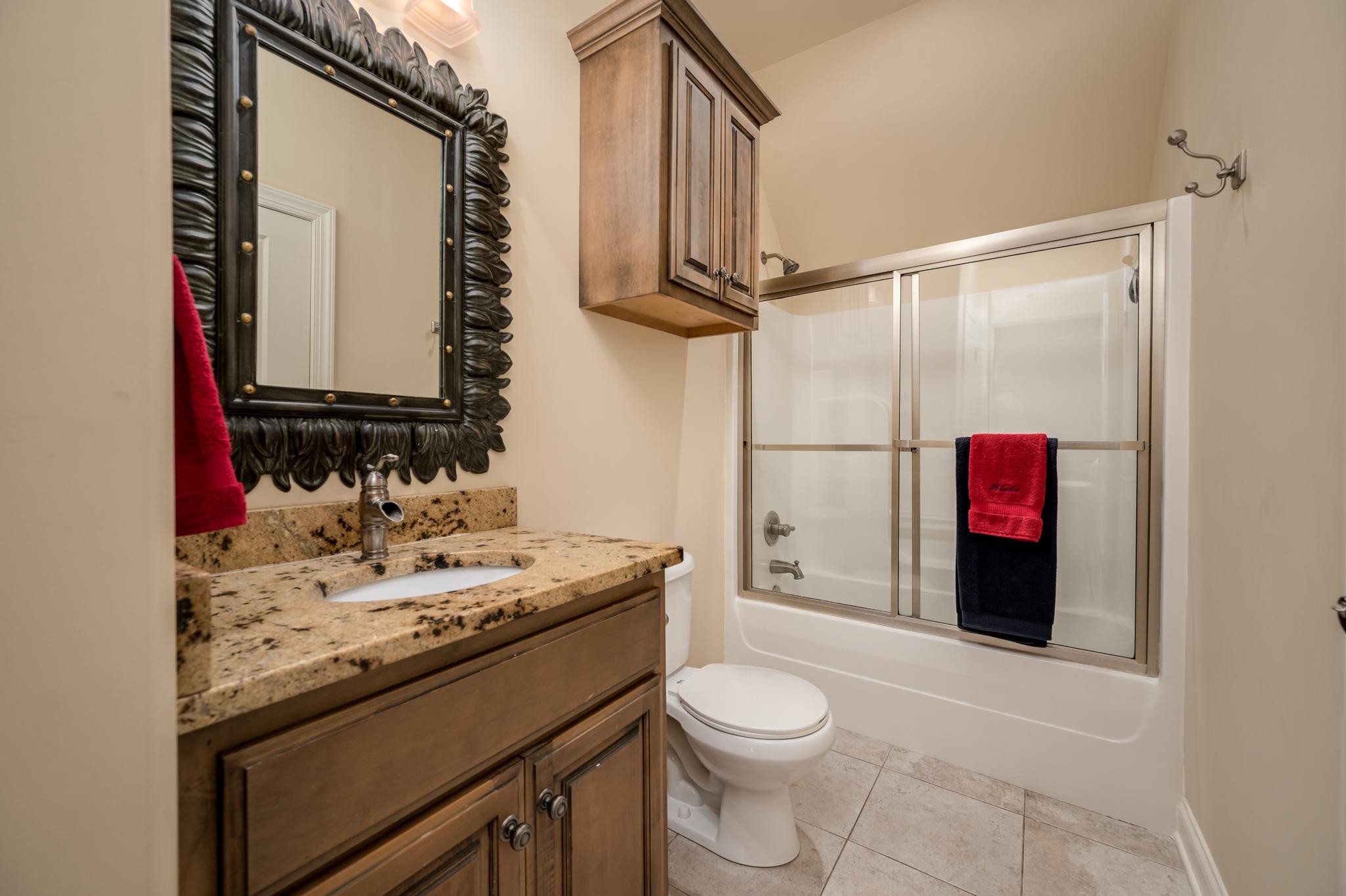 6201 Windrow Road Rockvale, TN 37153 - Photo 34 of 49 a bathroom with a granite countertop sink toilet and shower