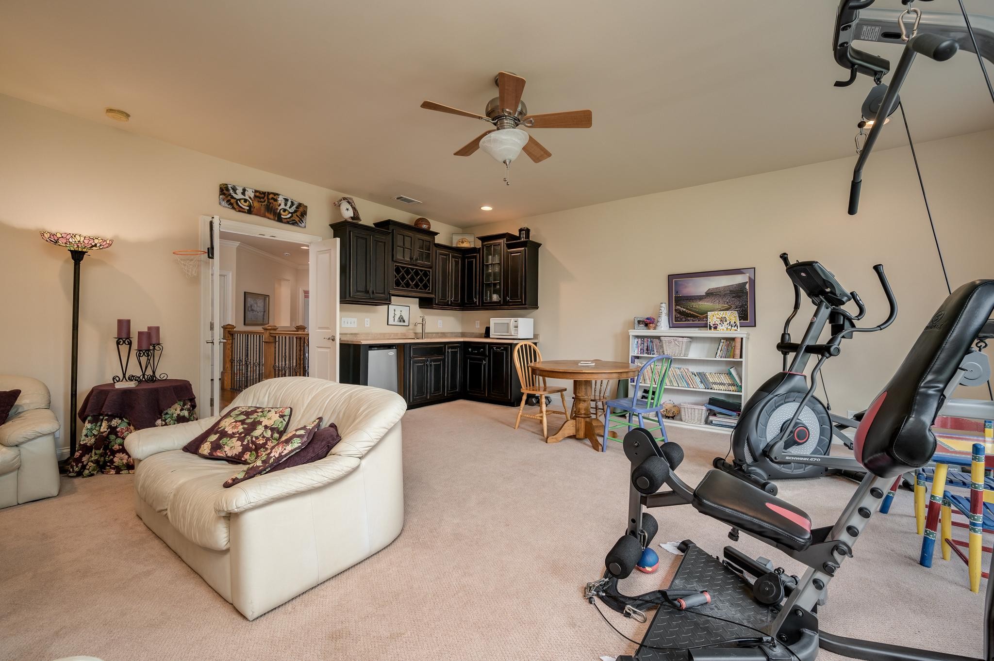 6201 Windrow Road Rockvale, TN 37153 - Photo 36 of 49 a living room with furniture a dining table and white walls
