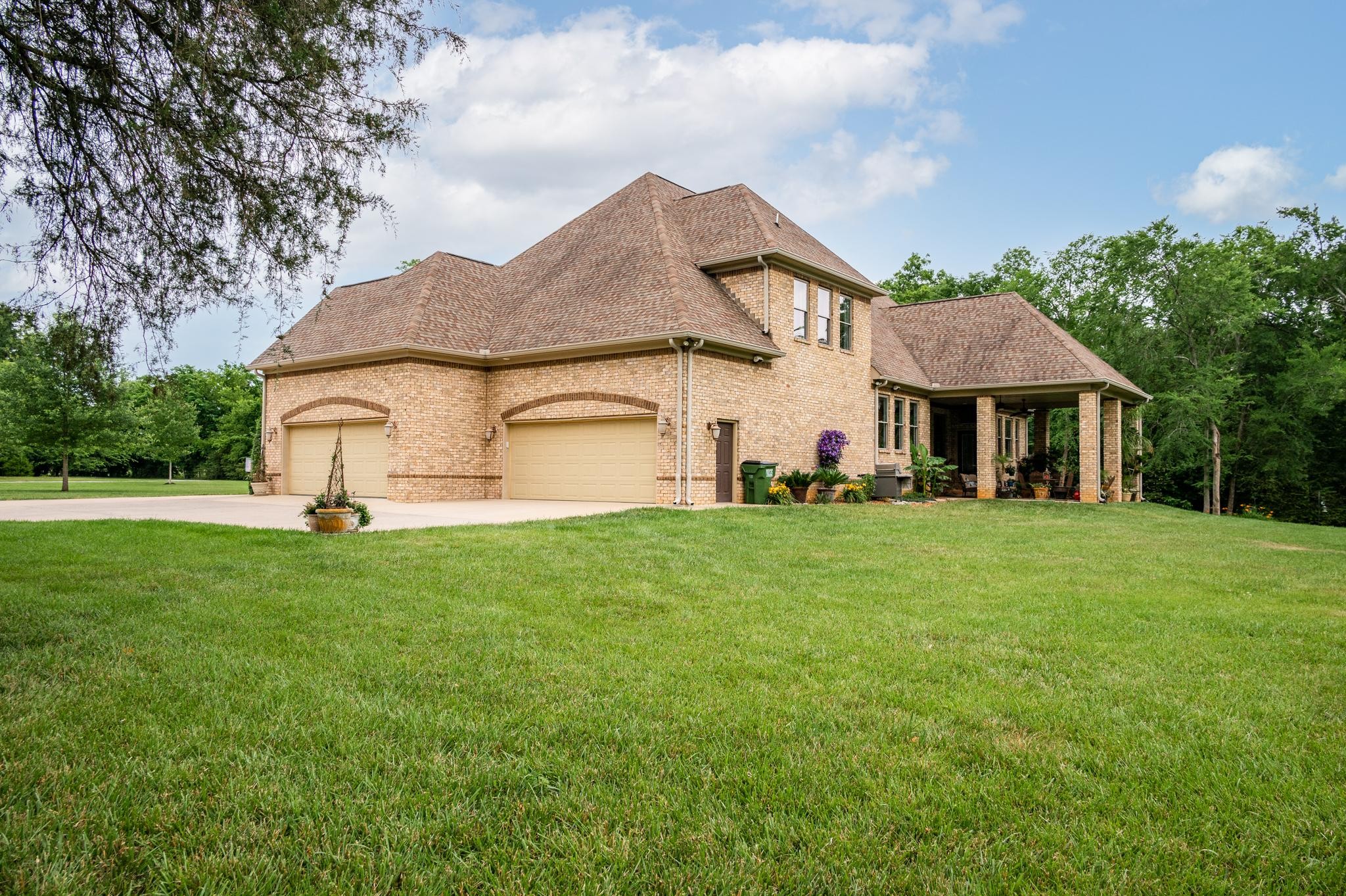 6201 Windrow Road Rockvale, TN 37153 - Photo 39 of 49 a front view of a house with a garden