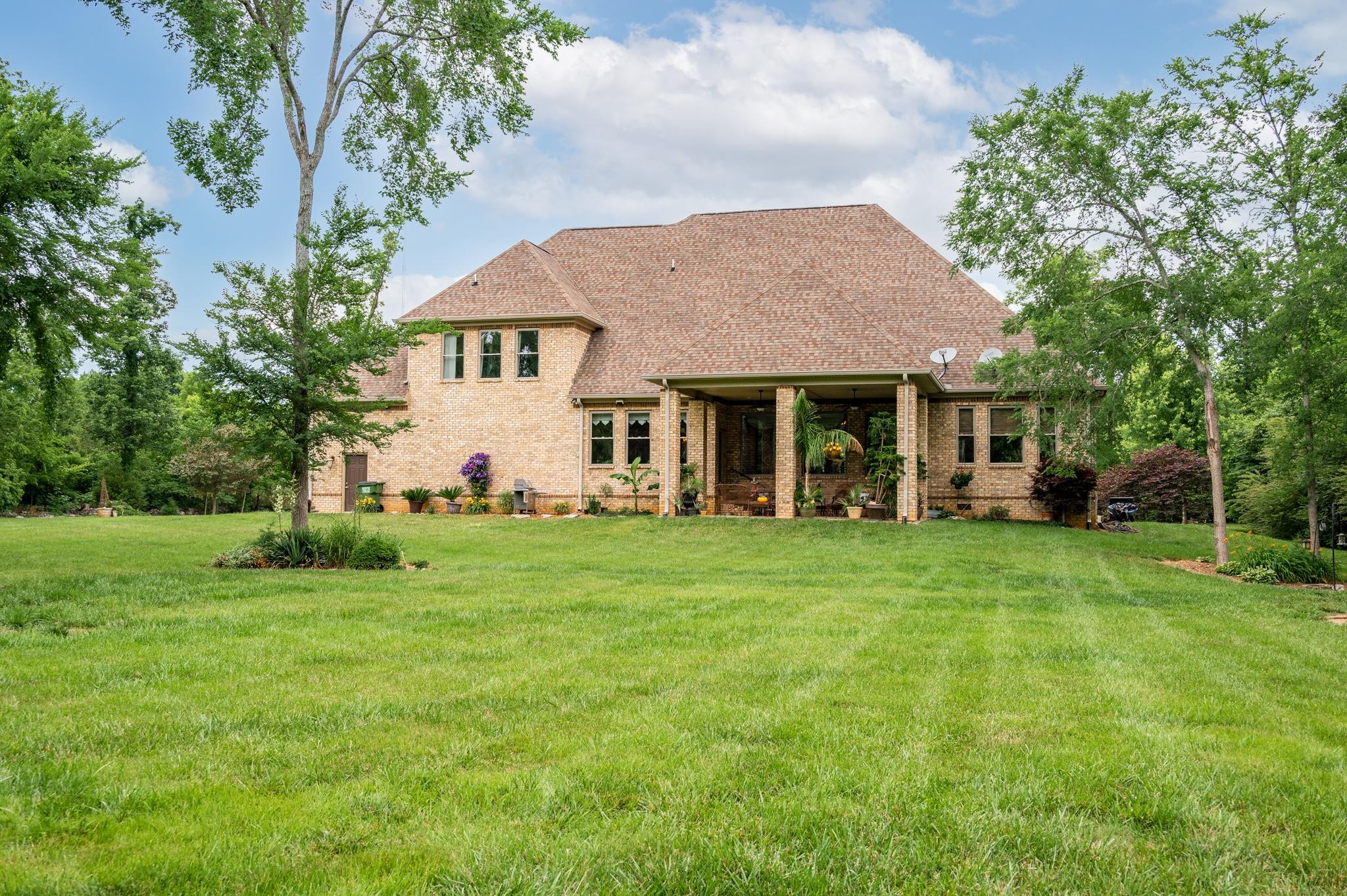 6201 Windrow Road Rockvale, TN 37153 - Photo 40 of 49 a front view of a house with a garden