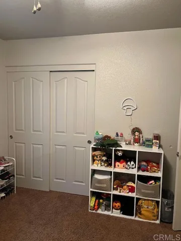 a view of a room with shelves