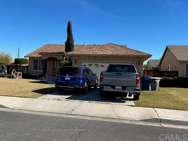 a car parked in front of a house