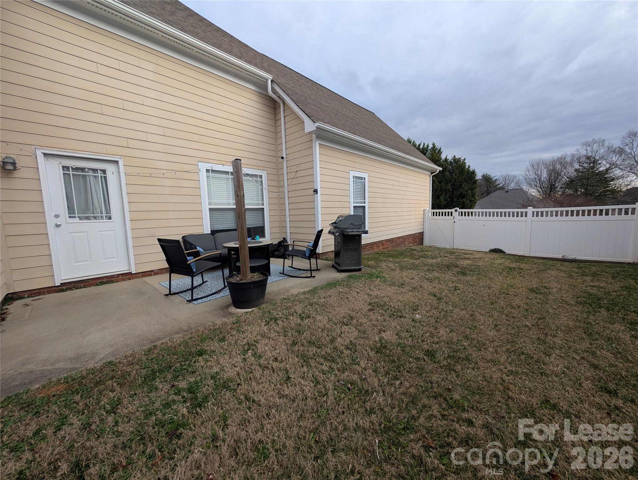 20207 Colony Point Lane Cornelius, NC 28031 - Photo 23 of 26 a view of a house with backyard and sitting area